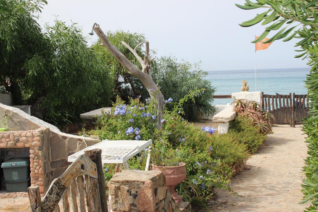 Studio Marinedda Isola Rossa Rum bild